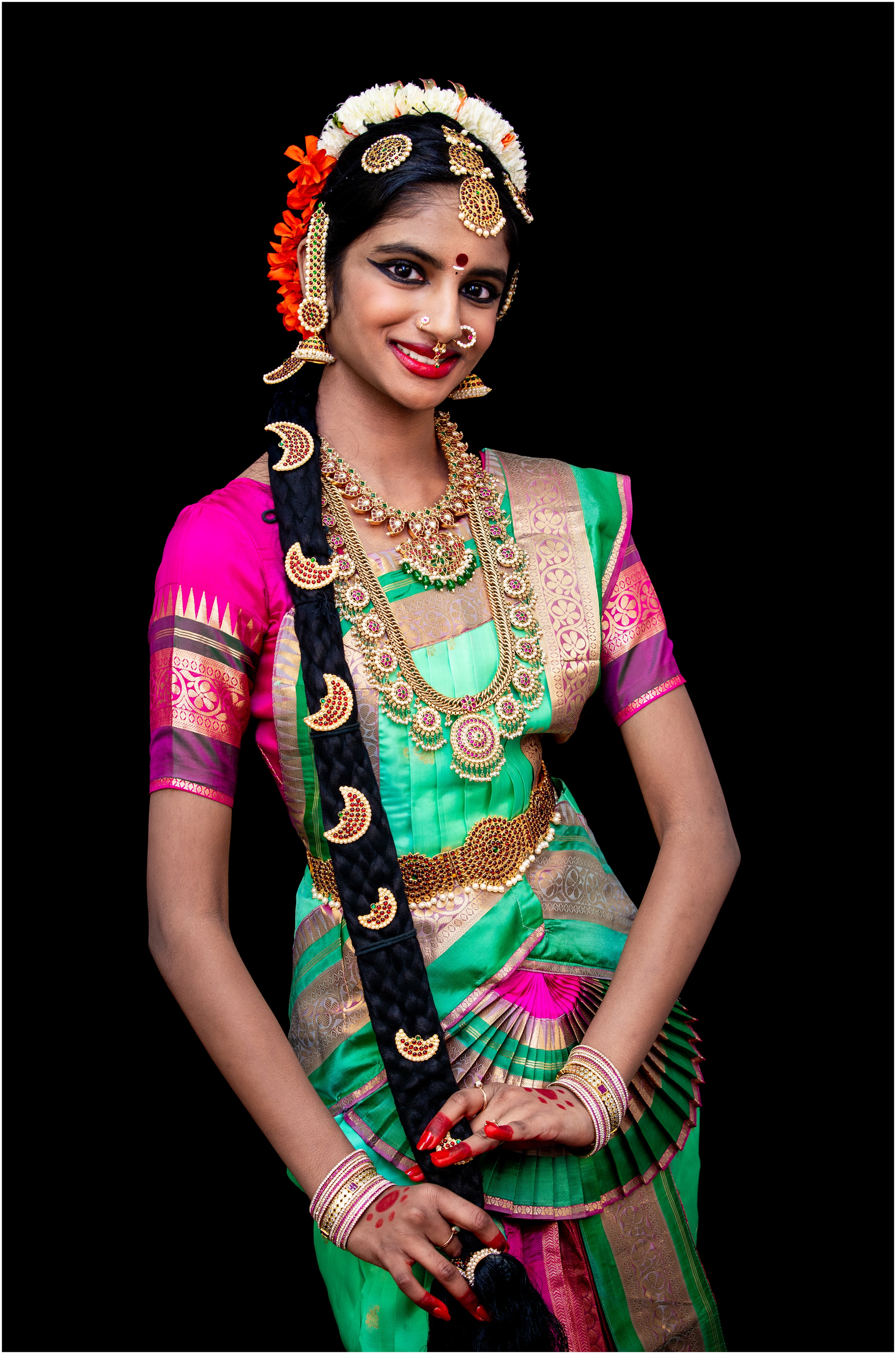 Green and magenta costume — portrait with jewellery